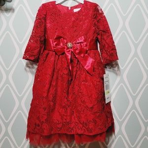 Rare Editions festival sprinkles red dress.